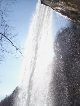 Under the big waterfall