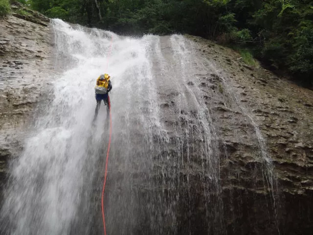 92 ft high abseiling down at the Écouges Lower Part. Vercors Massif.